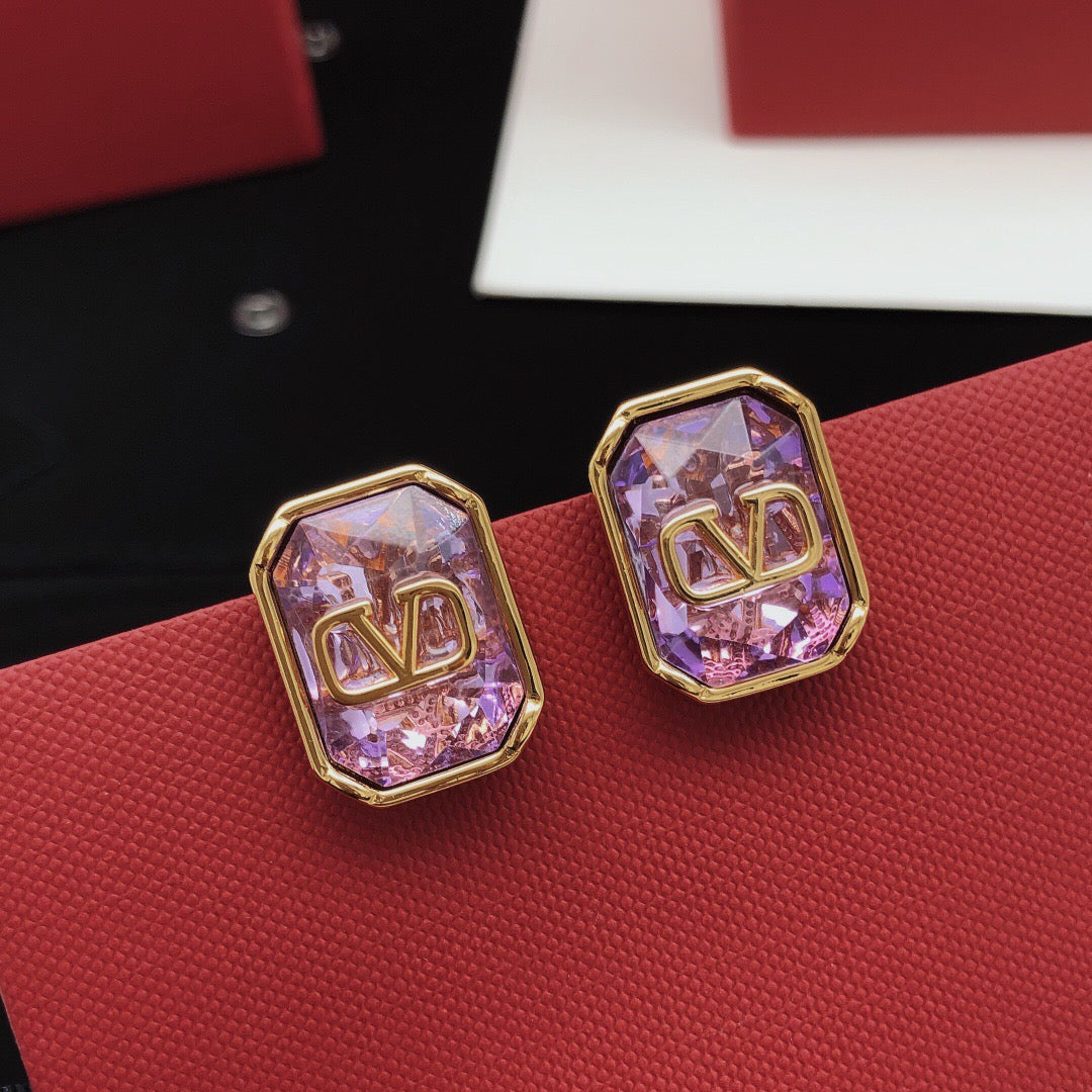 Martin Graham stud earrings in polished metal-tone – detail view