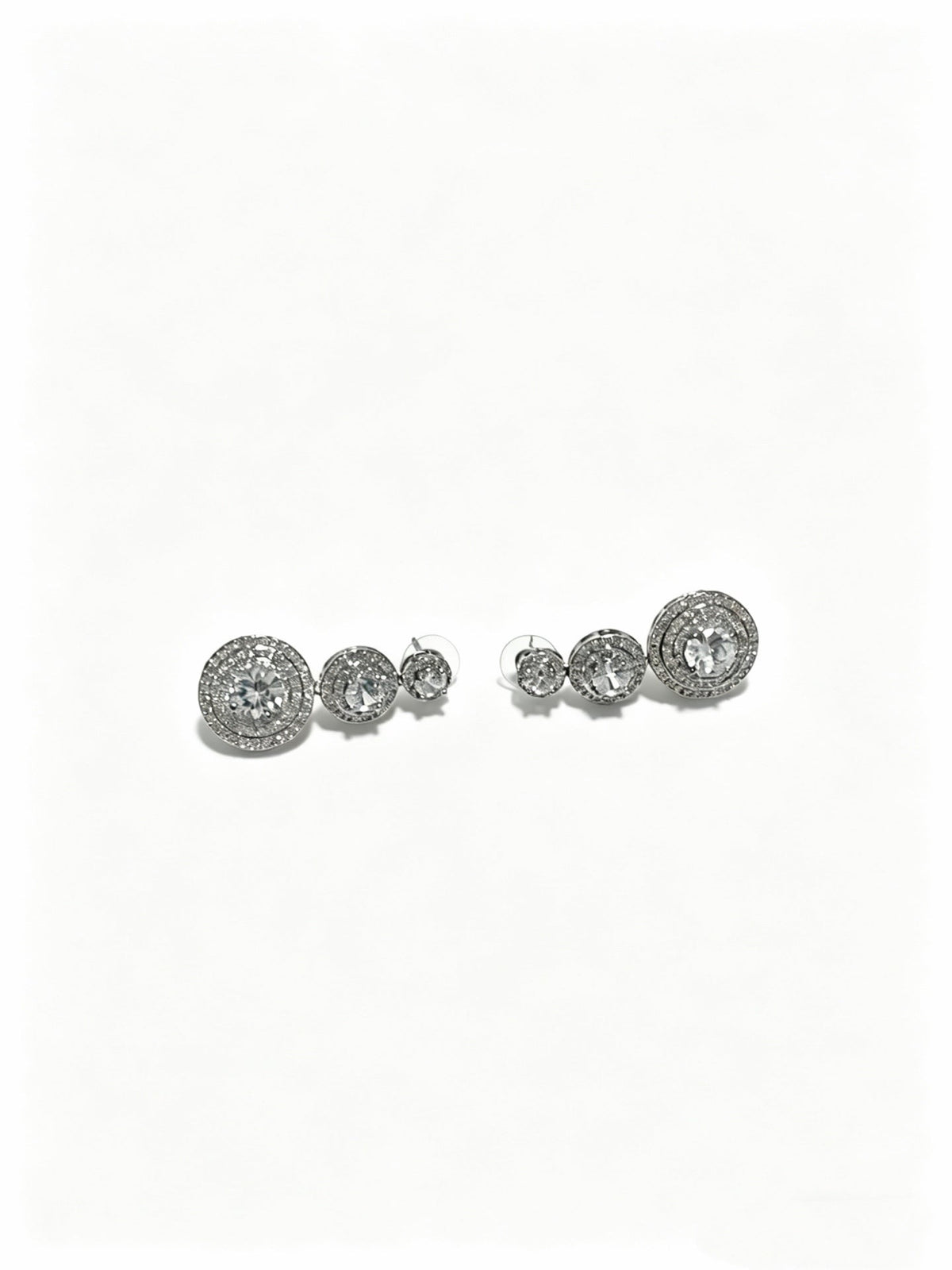 Martin Graham stud earrings in polished metal-tone – detail view