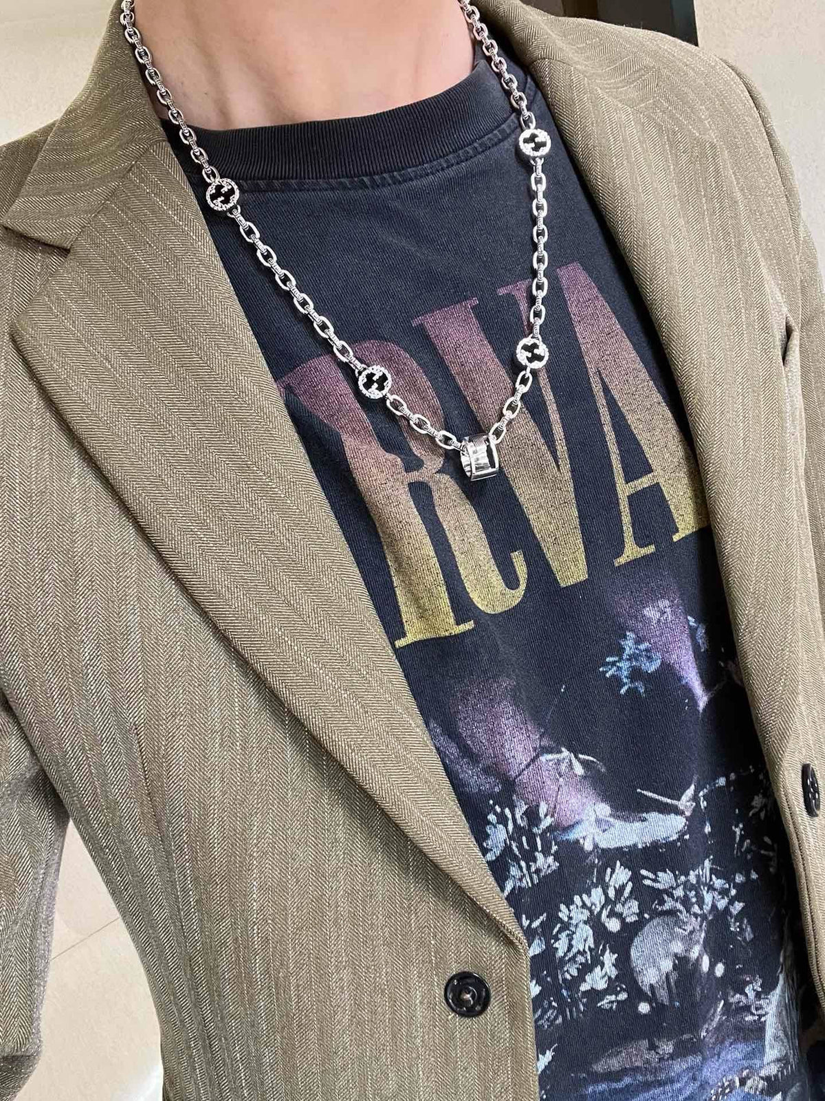 Martin Graham pendant necklace in polished metal-tone – detail view