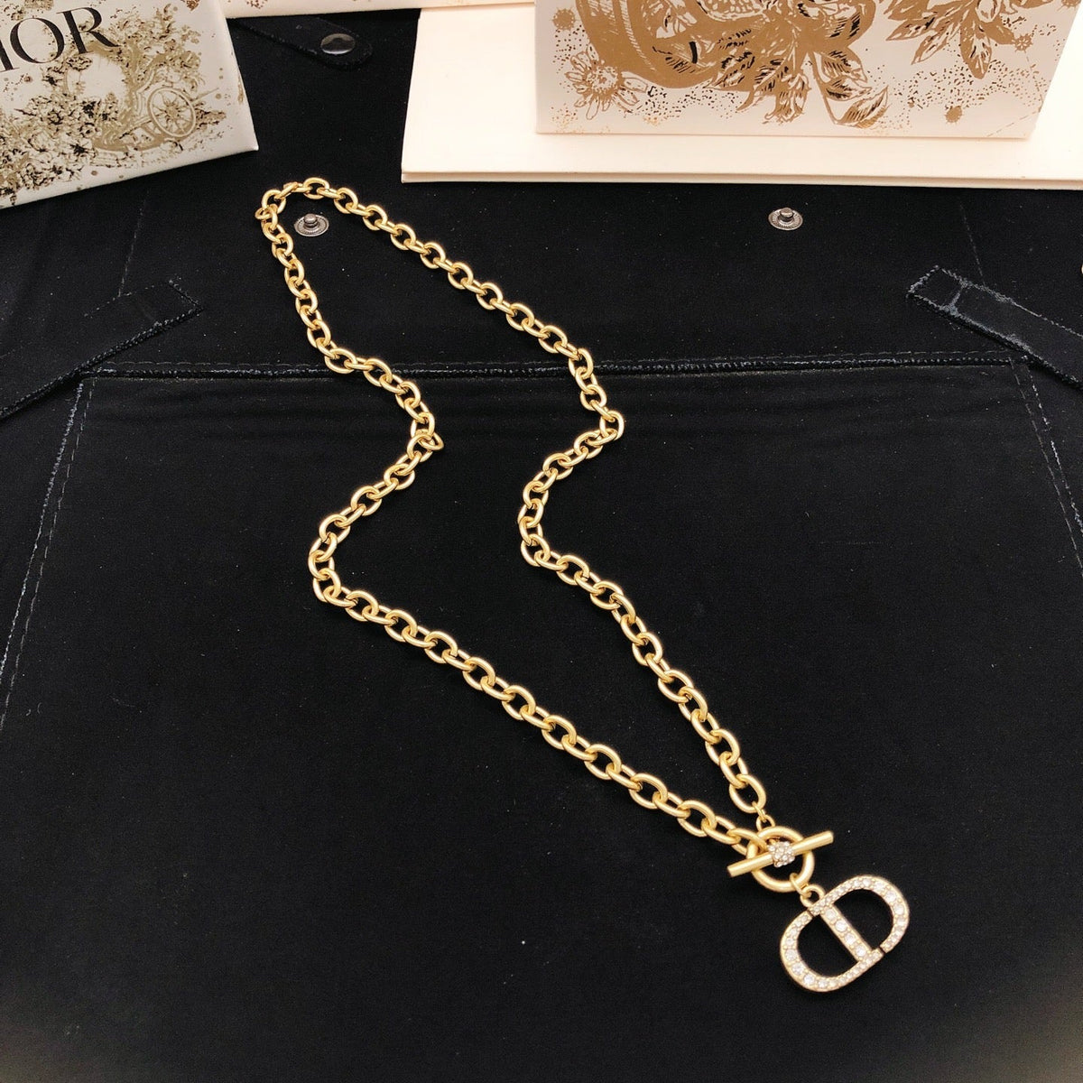 Martin Graham pendant necklace in polished metal-tone – detail view