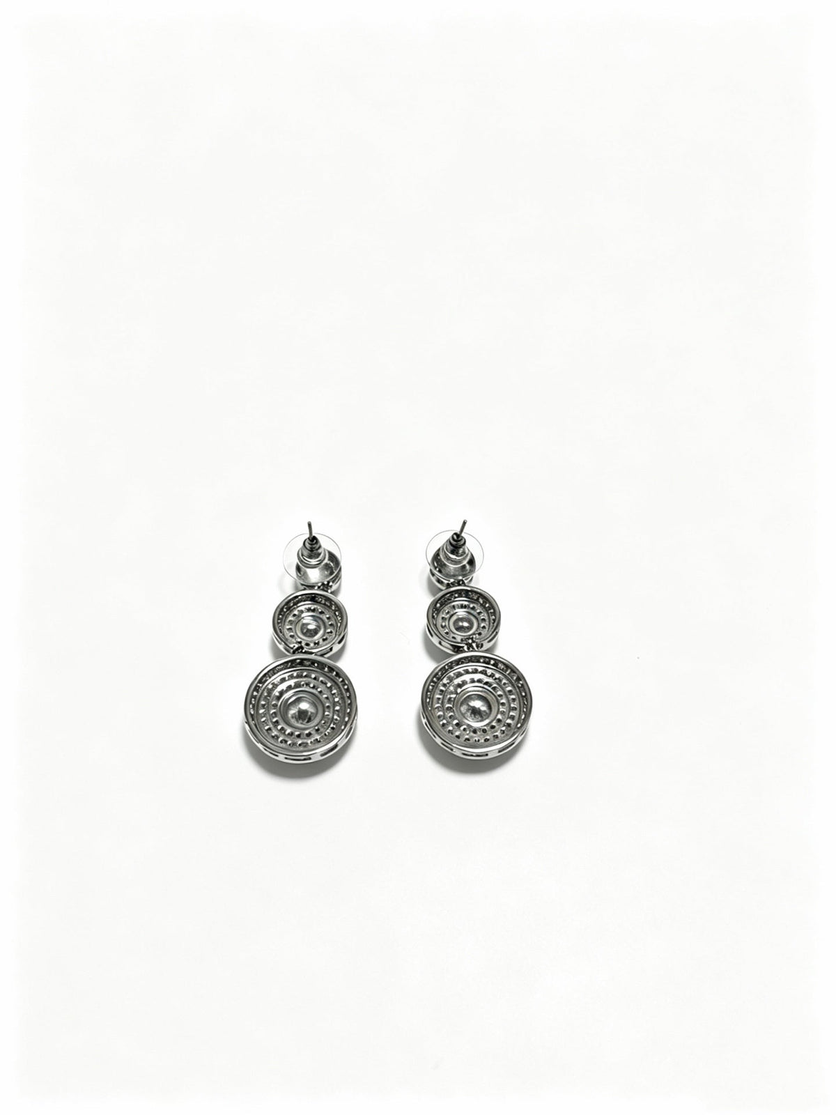 Martin Graham stud earrings in polished metal-tone – side detail
