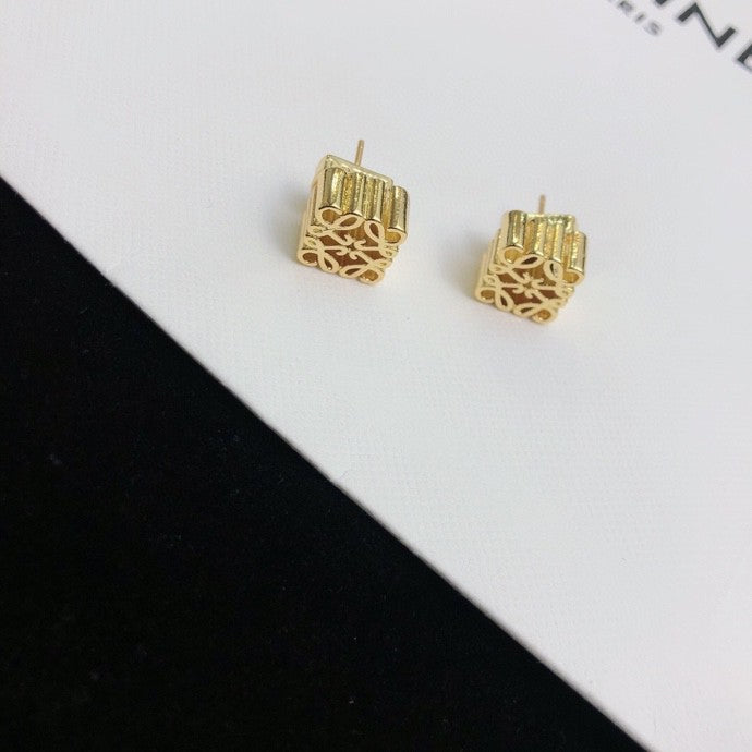 Martin Graham stud earrings in polished metal-tone – side detail