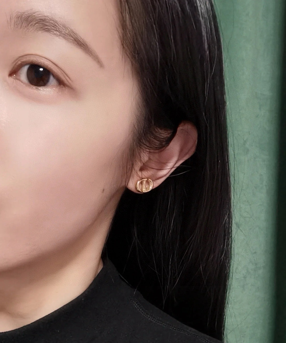 Martin Graham stud earrings in polished metal-tone – side detail