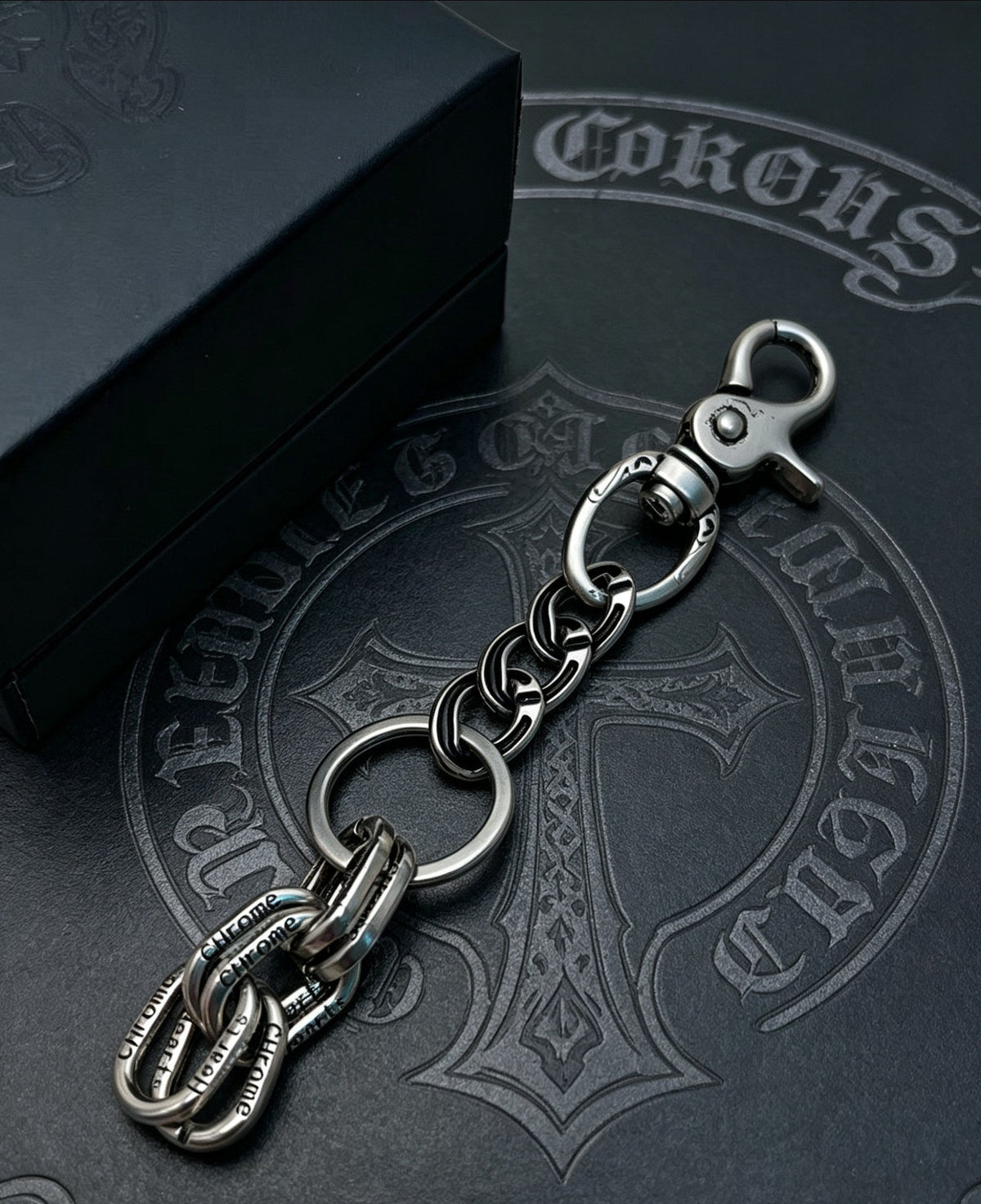 Martin Graham chain accessory in polished metal-tone – side detail