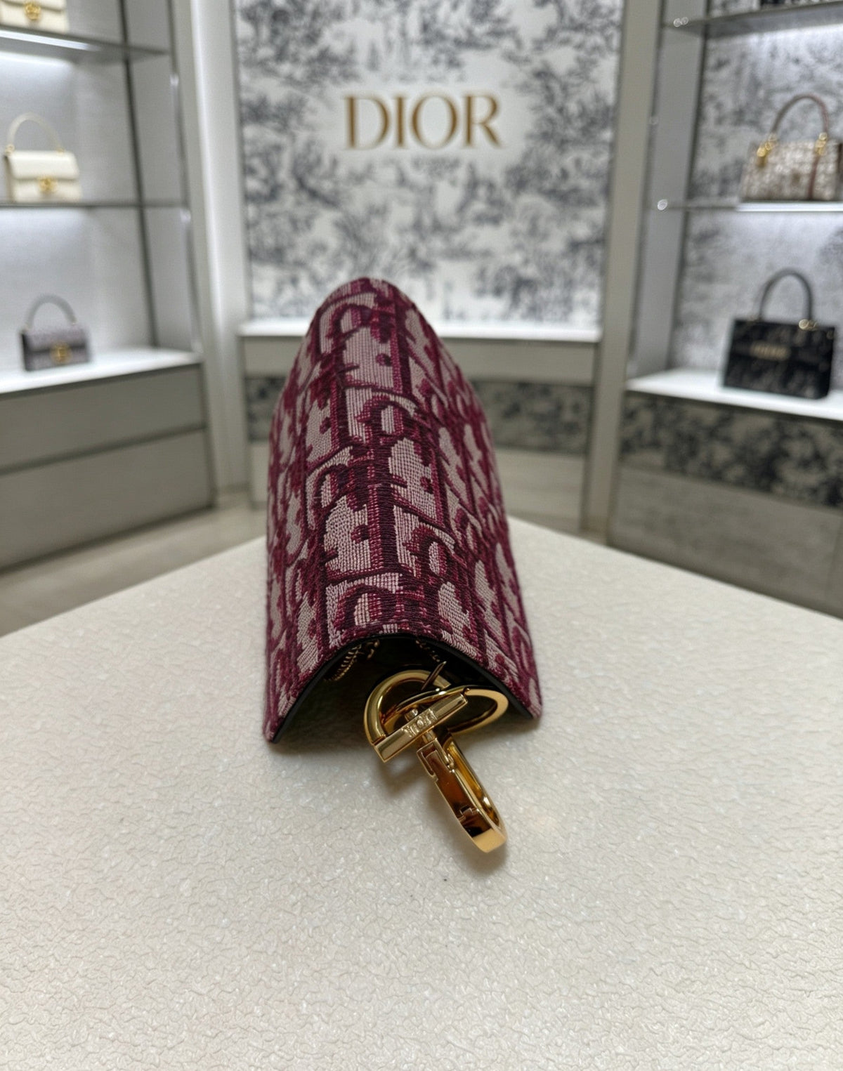 Martin Graham bag charm in polished metal-tone – side detail