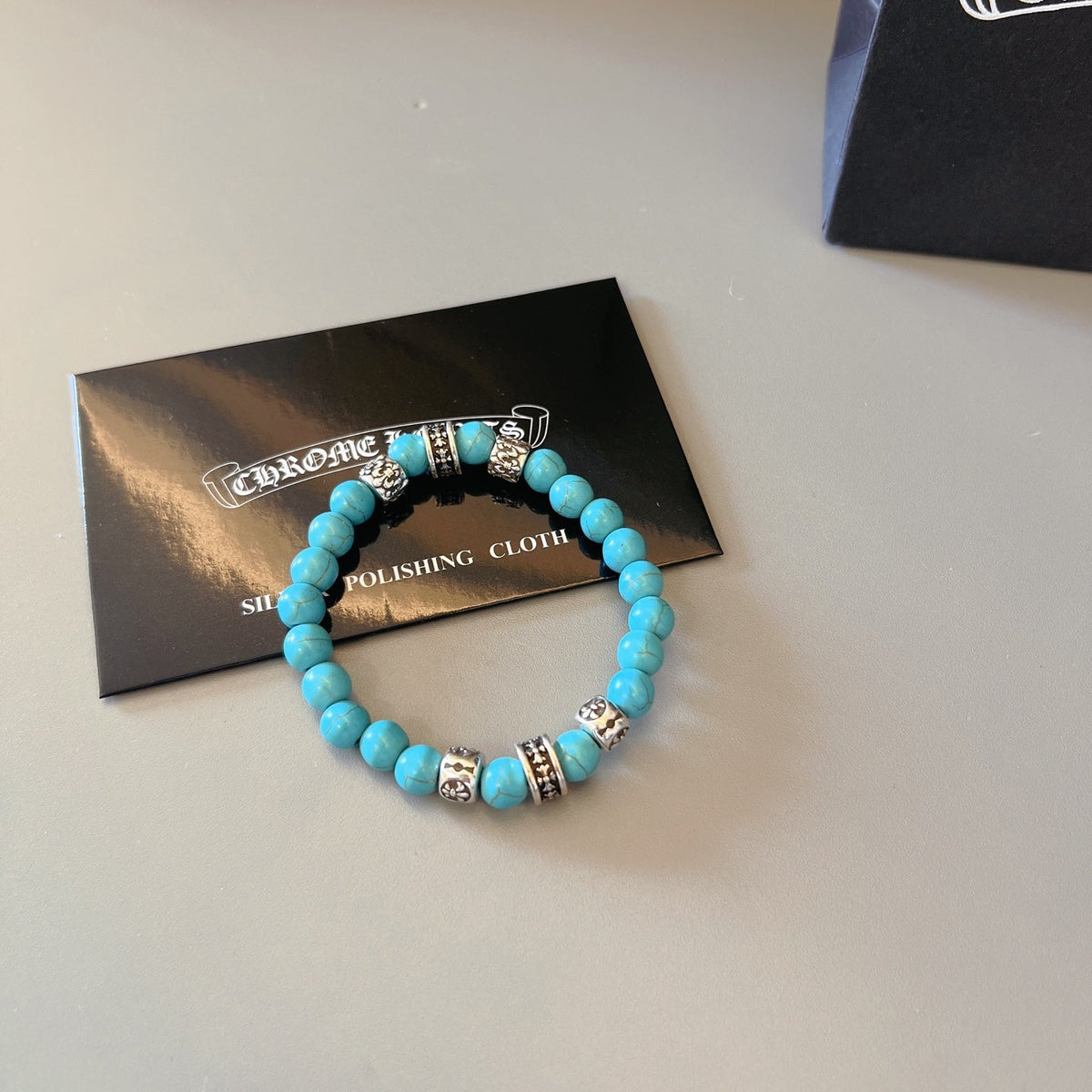 Martin Graham beaded bracelet in polished metal-tone – side detail