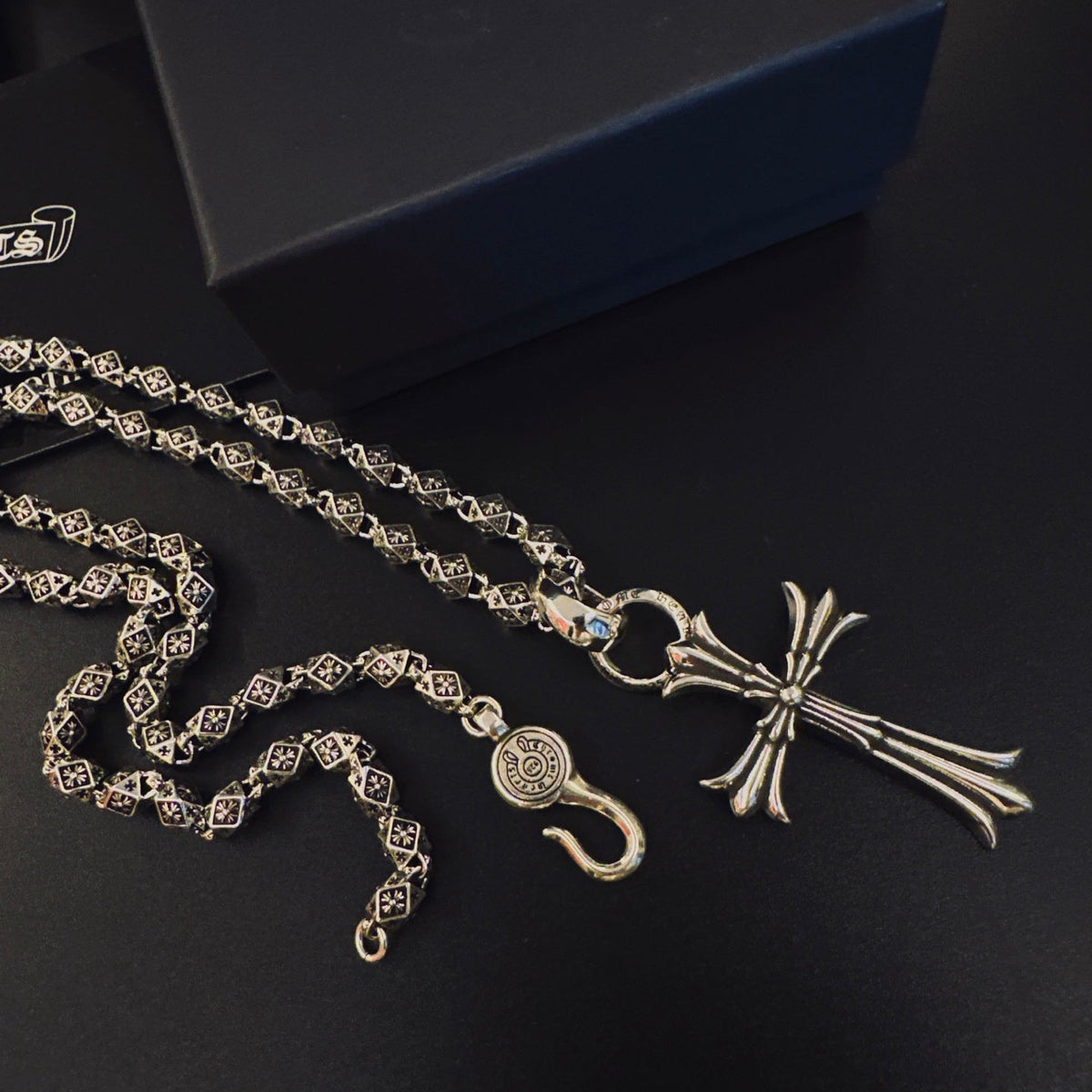 Martin Graham pendant necklace in polished metal-tone – side detail