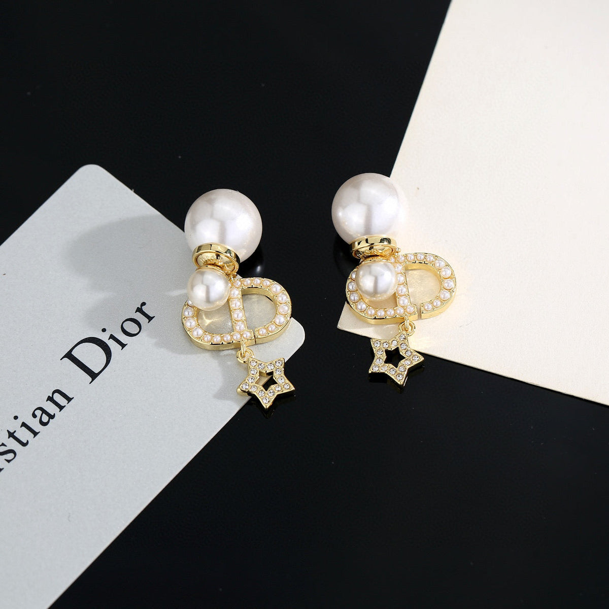 Martin Graham stud earrings in polished metal-tone – side detail