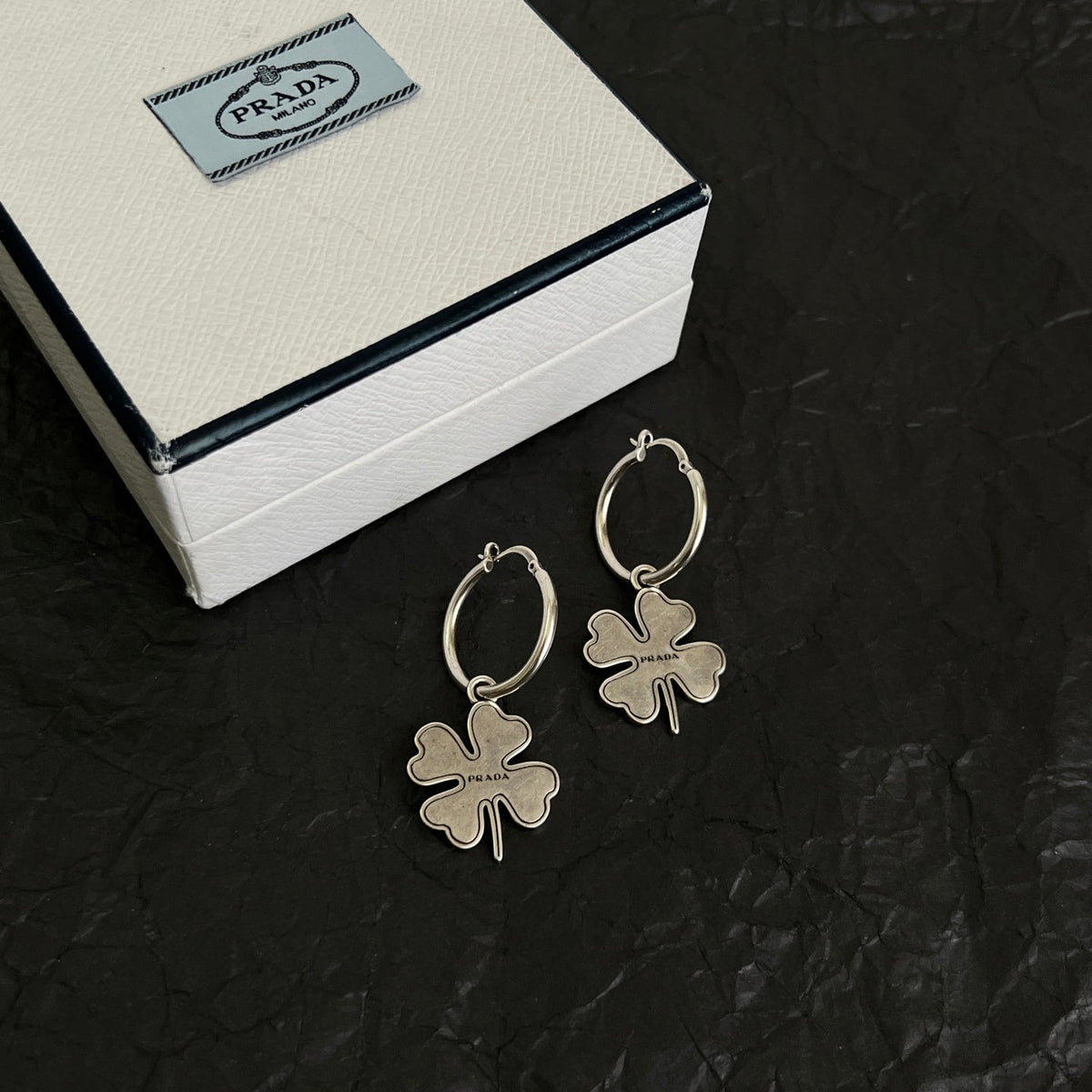 Martin Graham earrings in polished metal-tone – side detail