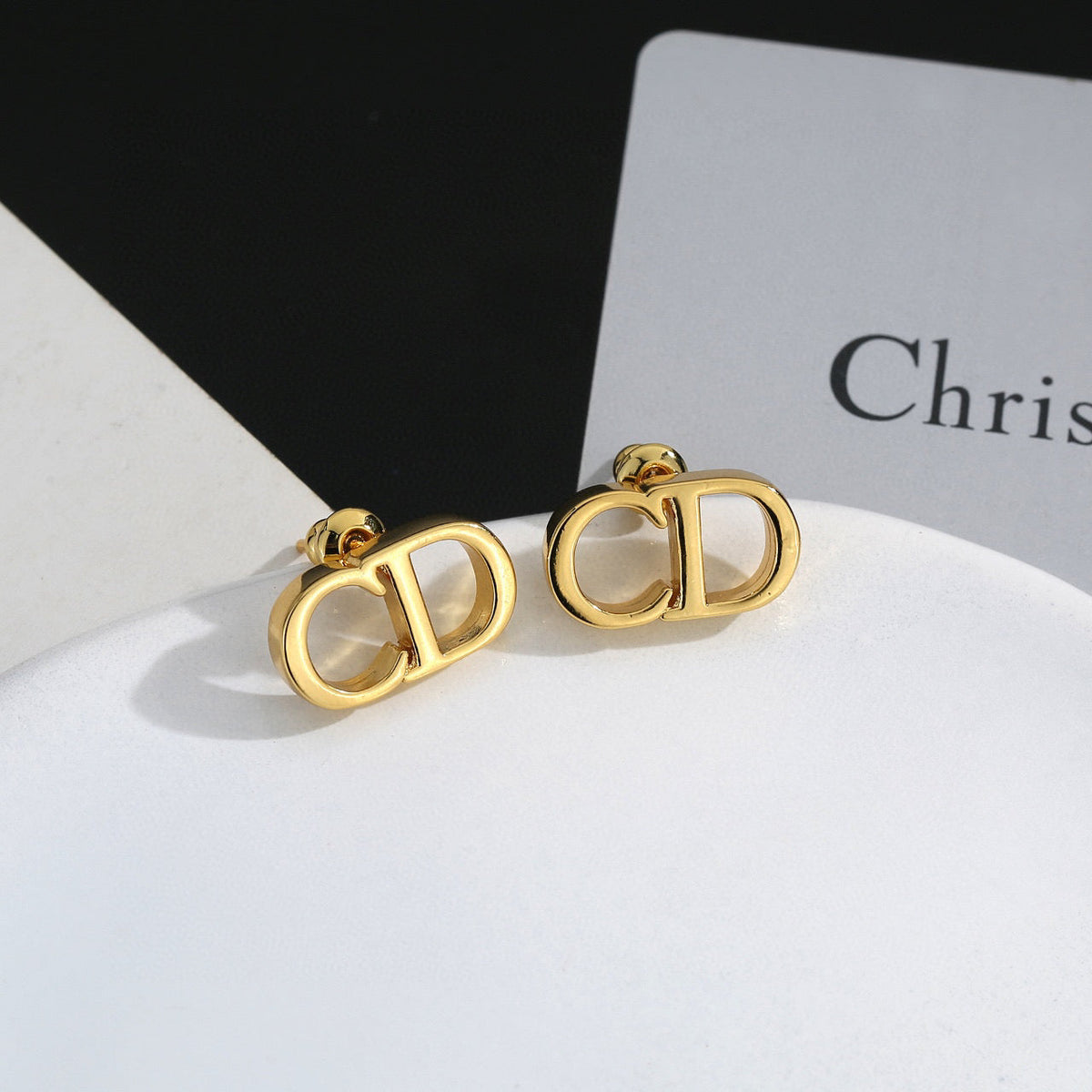 Martin Graham earrings in polished metal-tone – side detail
