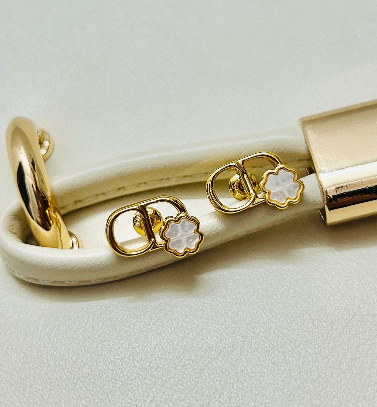 Martin Graham earrings in polished metal-tone – side detail