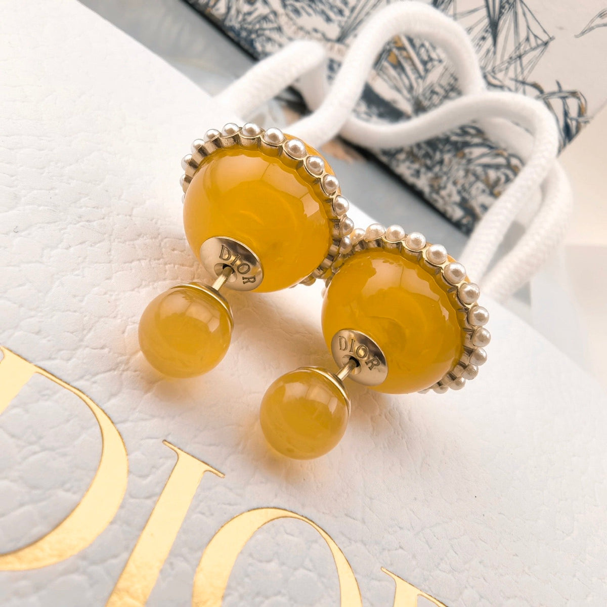 Martin Graham earrings in polished metal-tone – side detail