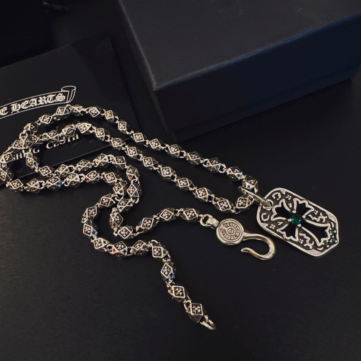 Martin Graham pendant necklace in polished metal-tone – side detail