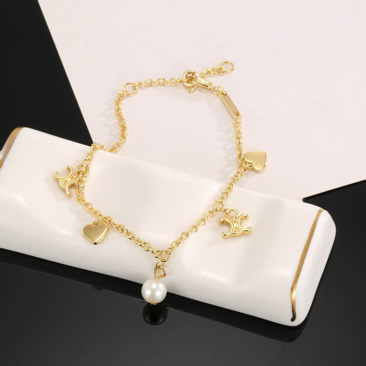 Martin Graham bracelet in polished metal-tone – side detail