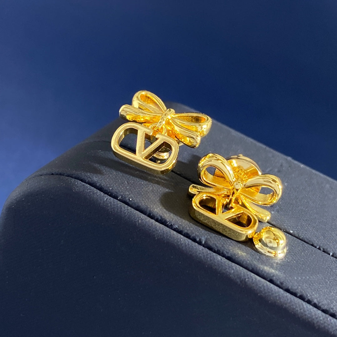 Martin Graham stud earrings in polished metal-tone – side detail