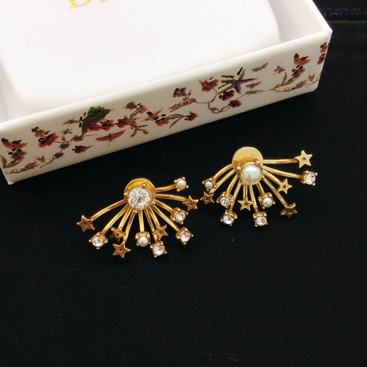 Martin Graham stud earrings in polished metal-tone – side detail