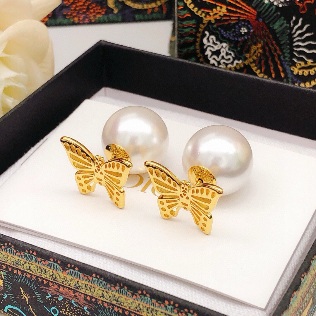 Martin Graham stud earrings in polished metal-tone – side detail