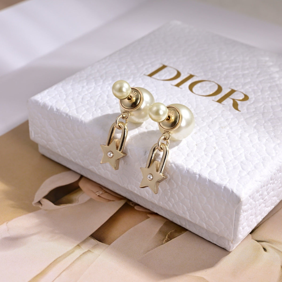 Martin Graham earrings in polished metal-tone – side detail