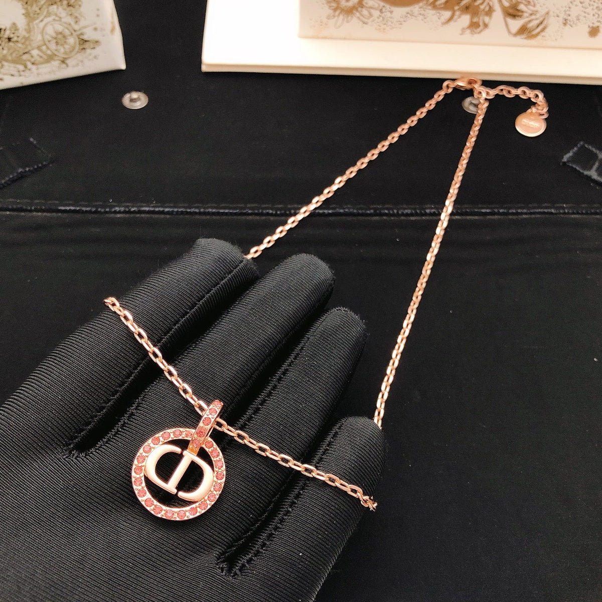 Martin Graham pendant necklace in polished metal-tone – side detail