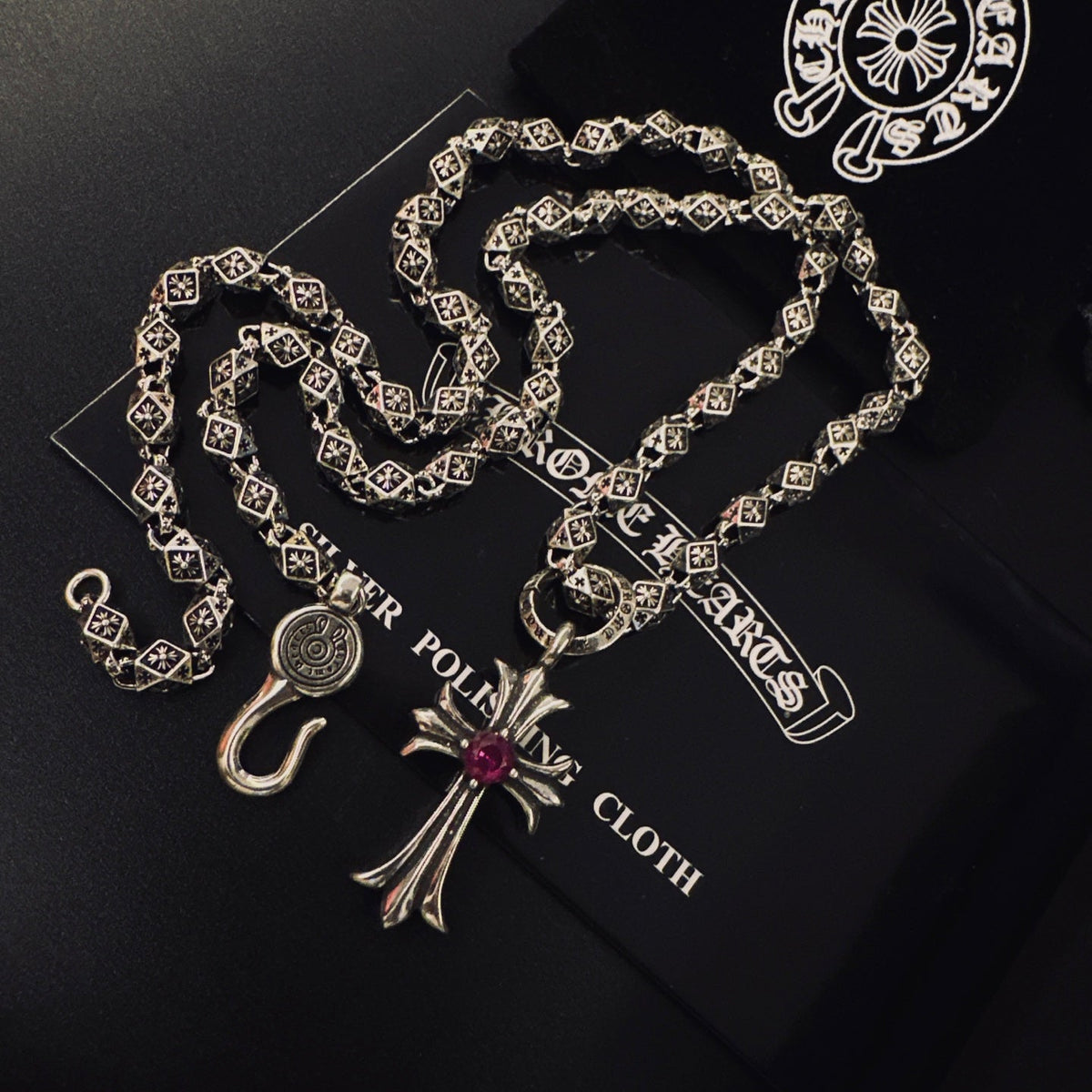 Martin Graham pendant necklace in polished metal-tone – side detail