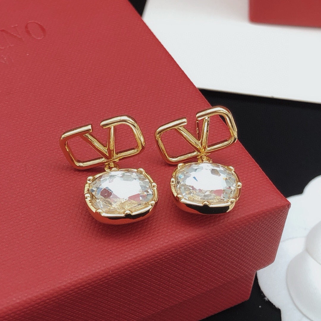 Martin Graham stud earrings in polished metal-tone – side detail