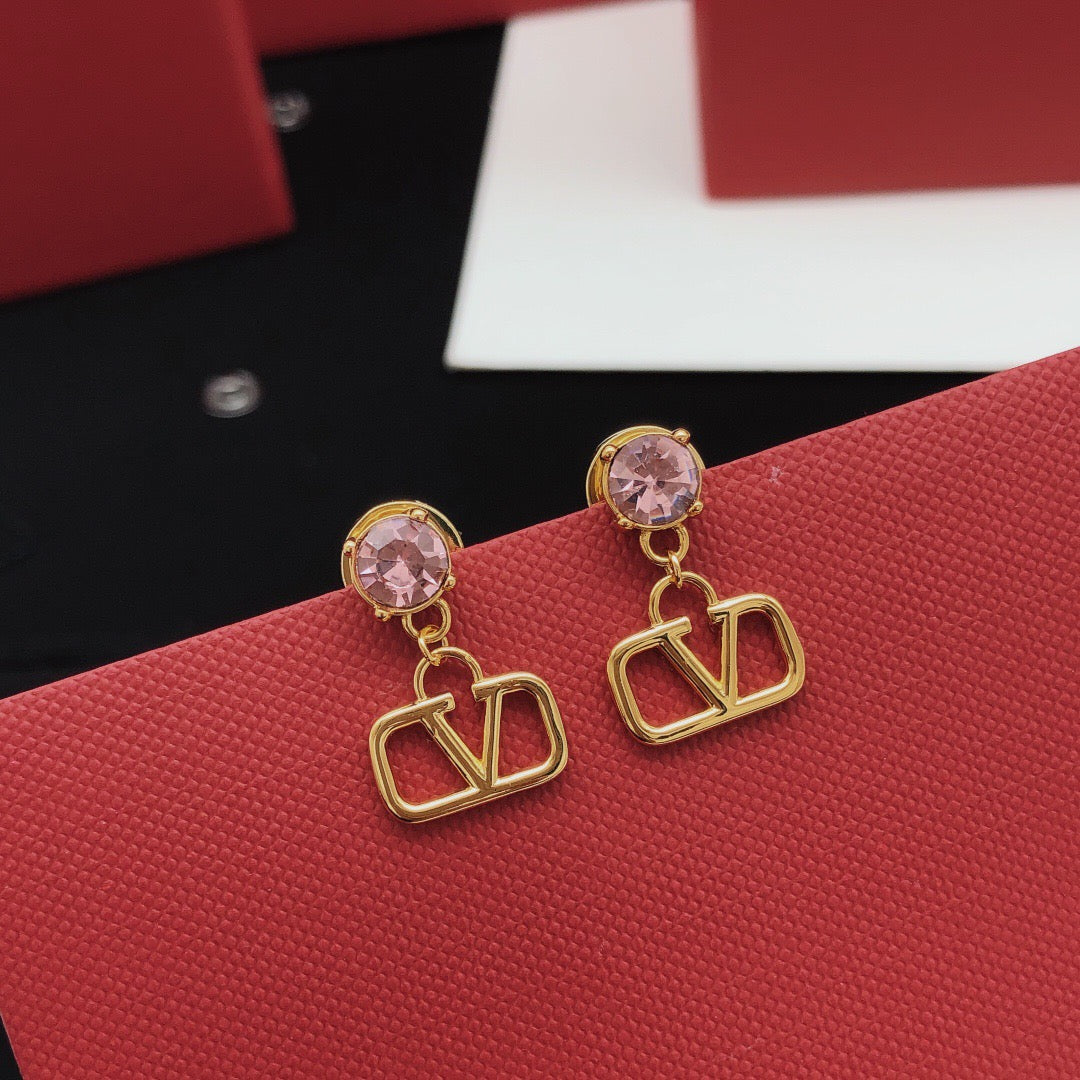 Martin Graham stud earrings in polished metal-tone – side detail