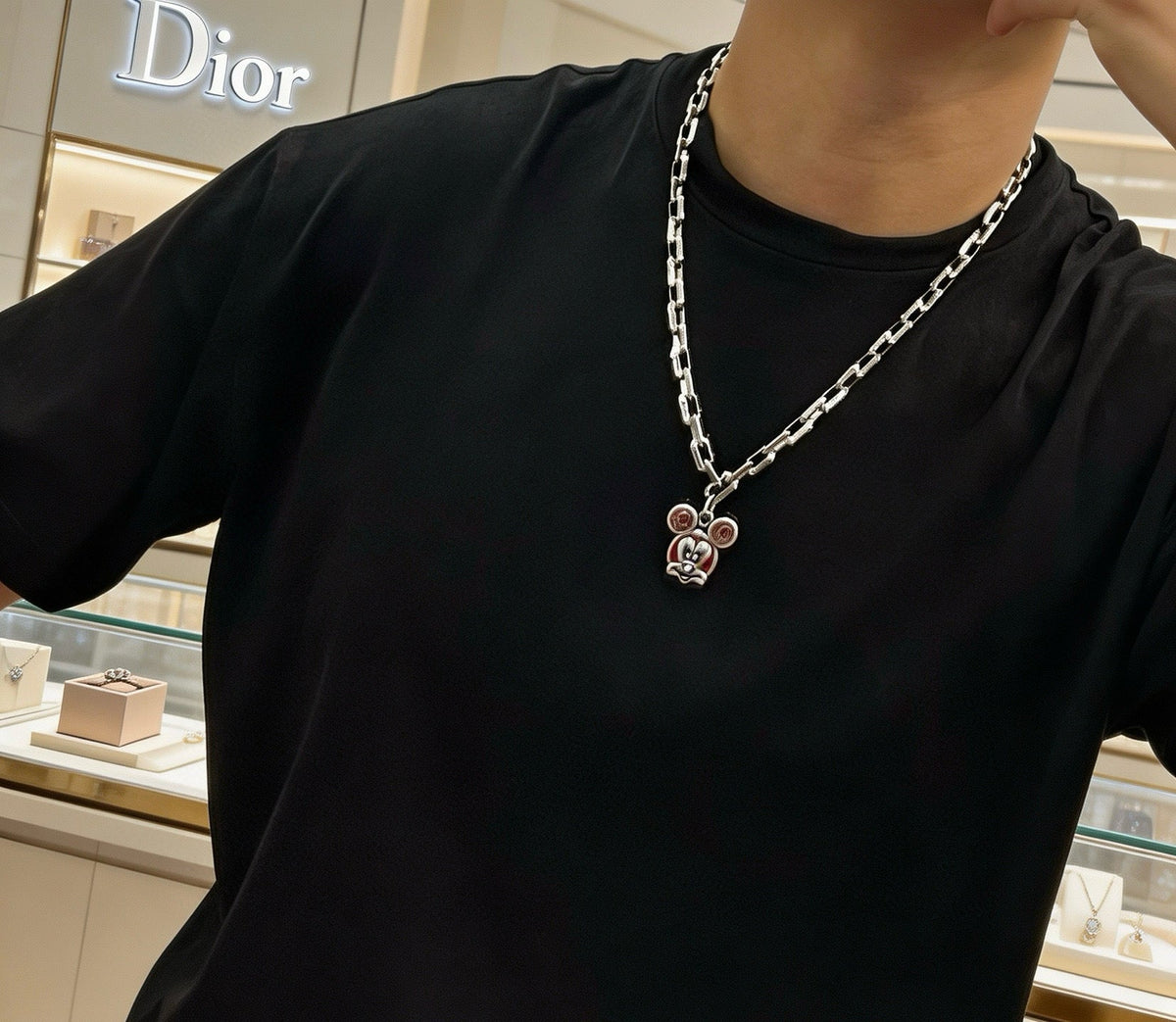 Martin Graham pendant necklace in polished metal-tone – side detail