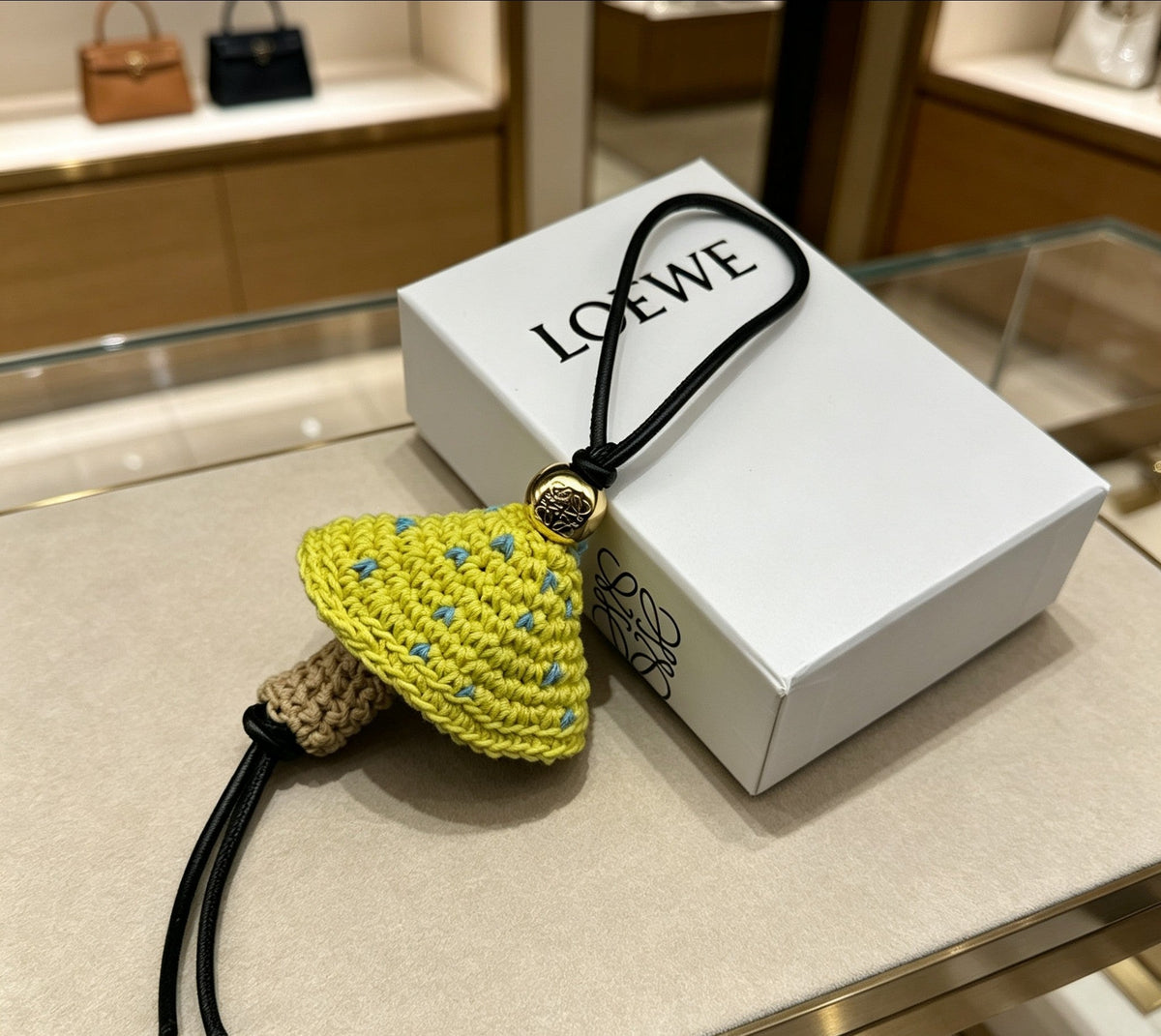 Martin Graham bag charm in polished metal-tone – side detail