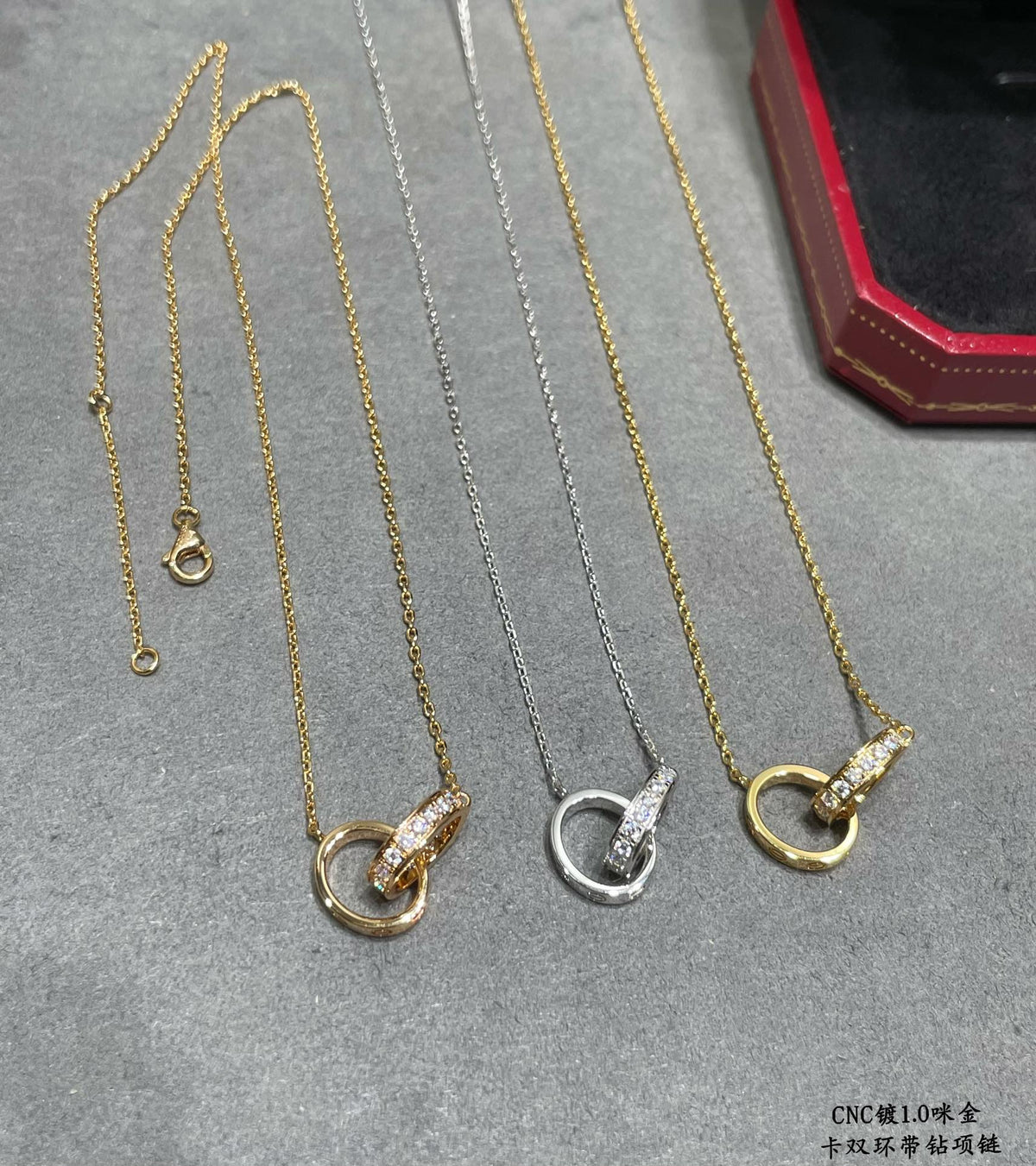 Martin Graham pendant necklace in polished metal-tone – side detail