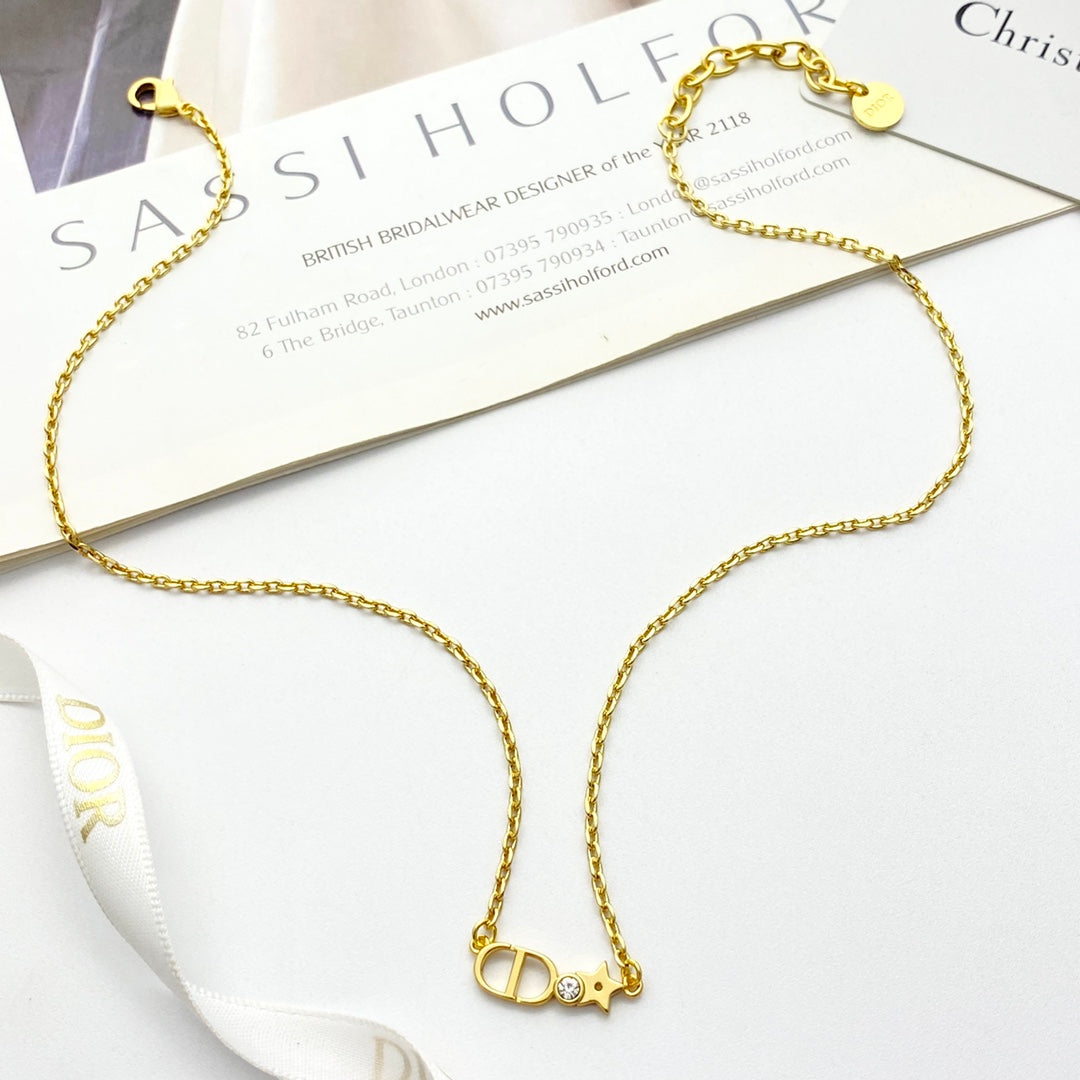 Martin Graham pendant necklace in polished metal-tone – side detail