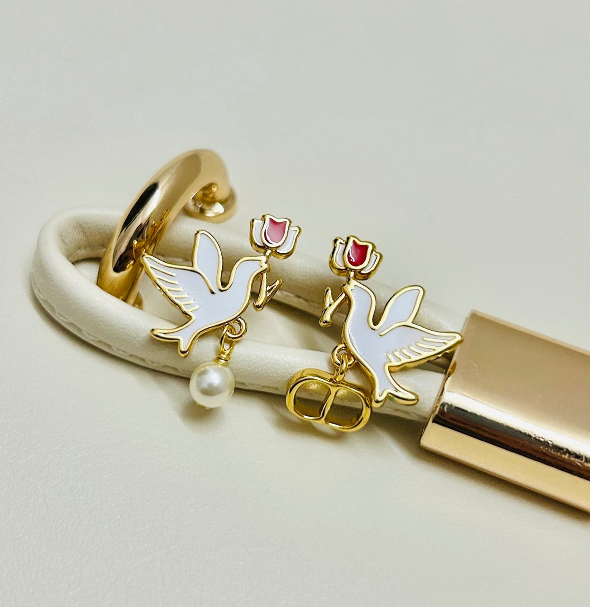 Martin Graham earrings in polished metal-tone – side detail