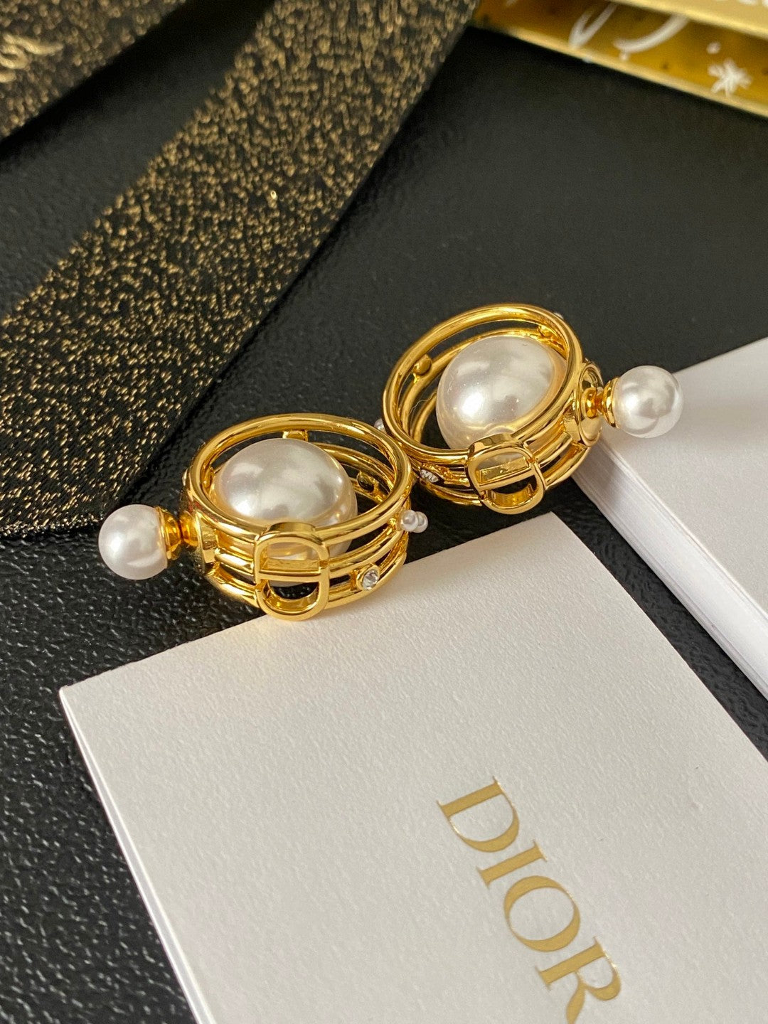 Martin Graham earrings in polished metal-tone – side detail