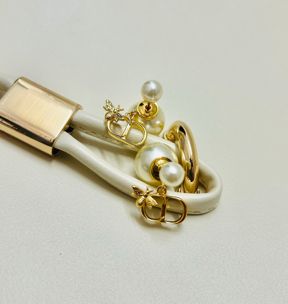 Martin Graham earrings in polished metal-tone – side detail