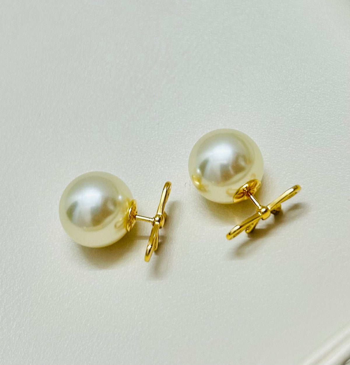 Martin Graham earrings in polished metal-tone – side detail