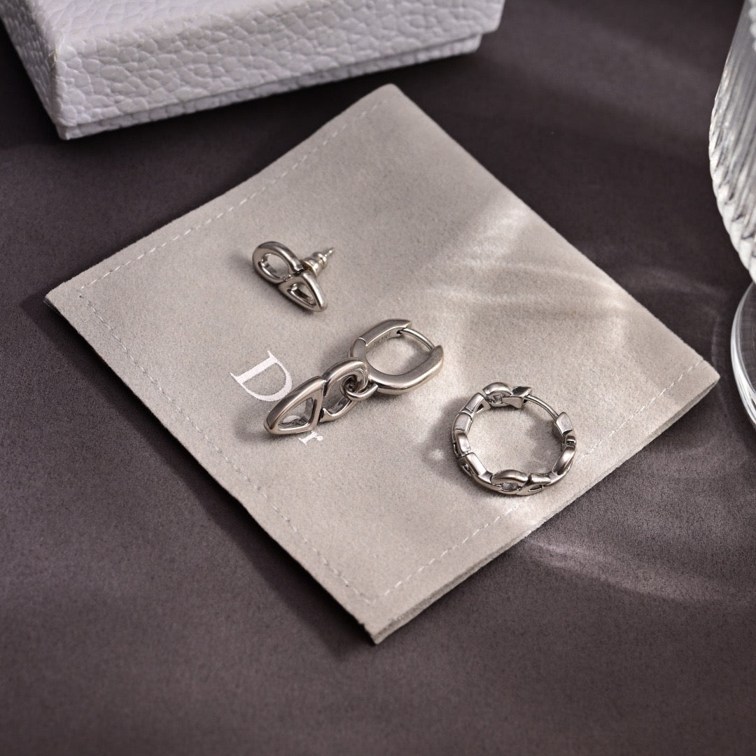 Martin Graham stud earrings in polished metal-tone – side detail