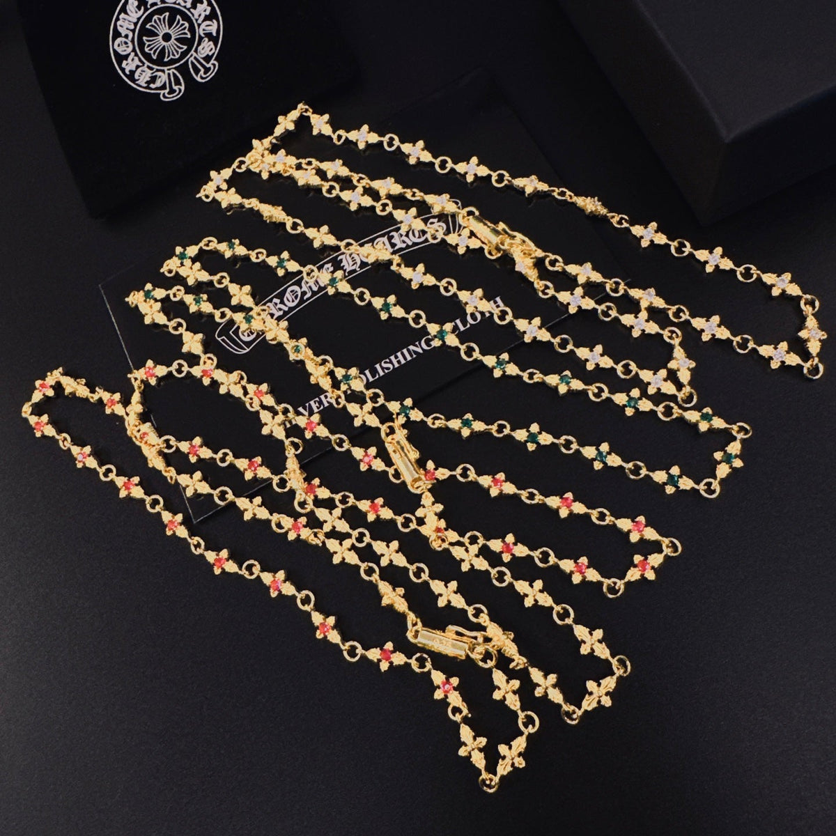 Martin Graham pendant necklace in polished metal-tone – side detail