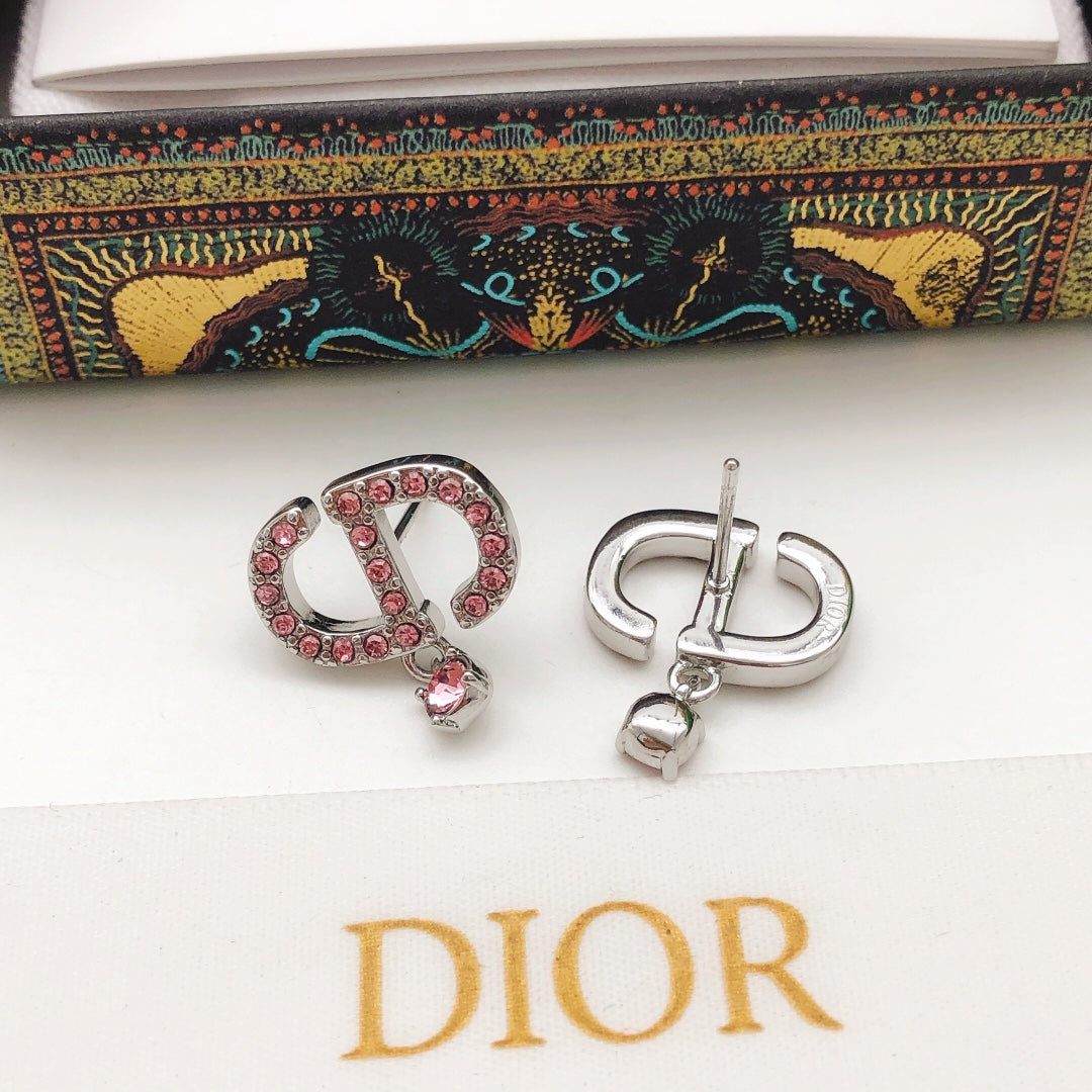 Martin Graham stud earrings in polished metal-tone – side detail