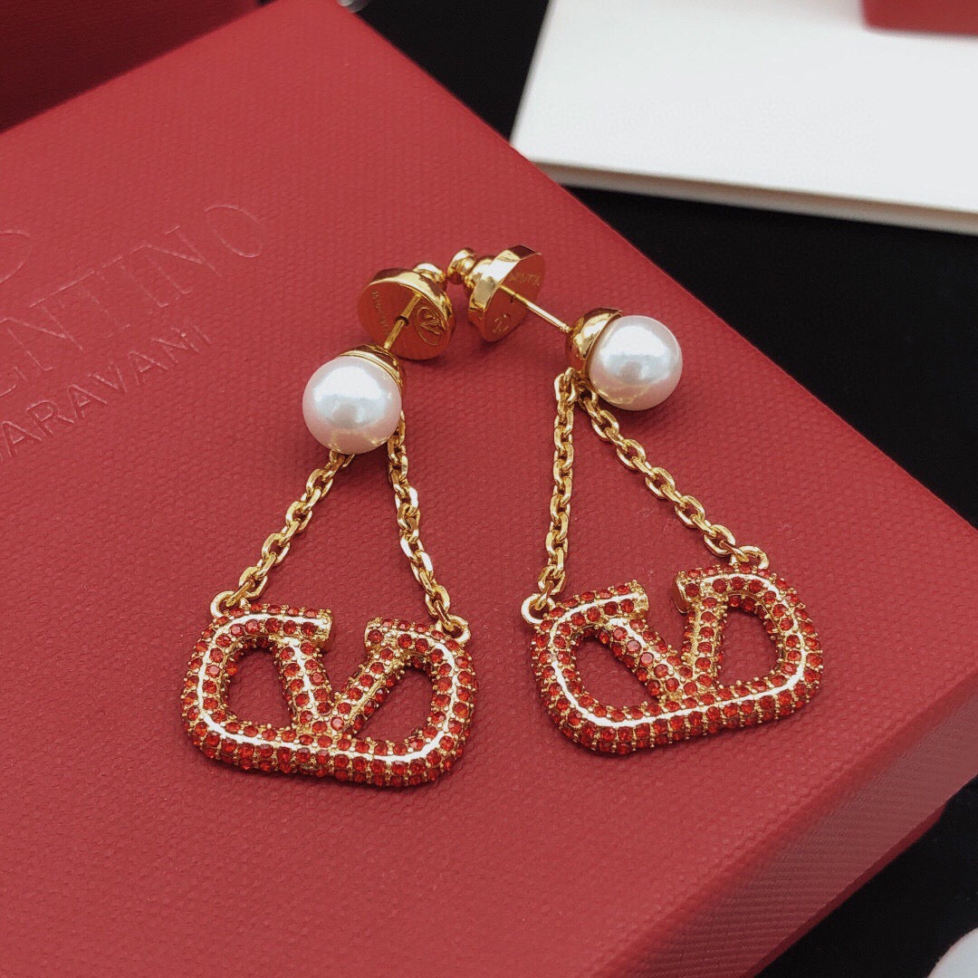 Martin Graham stud earrings in polished metal-tone – side detail