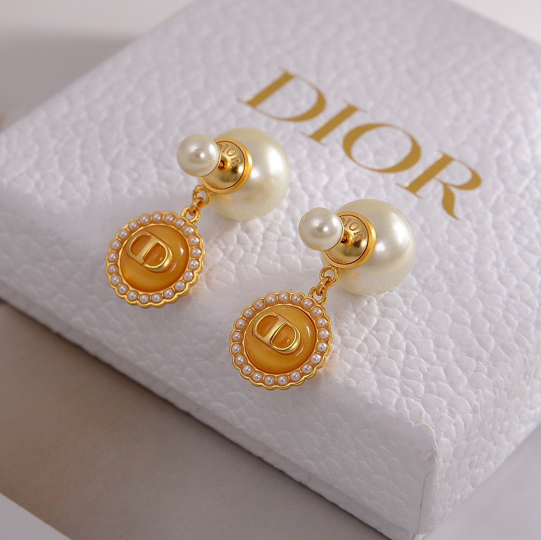 Martin Graham stud earrings in polished metal-tone – side detail