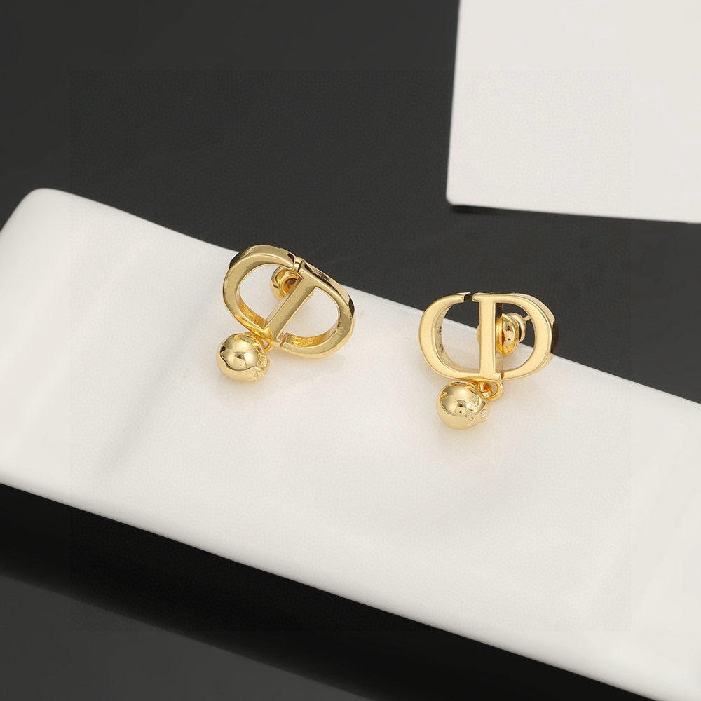 Martin Graham earrings in polished metal-tone – side detail