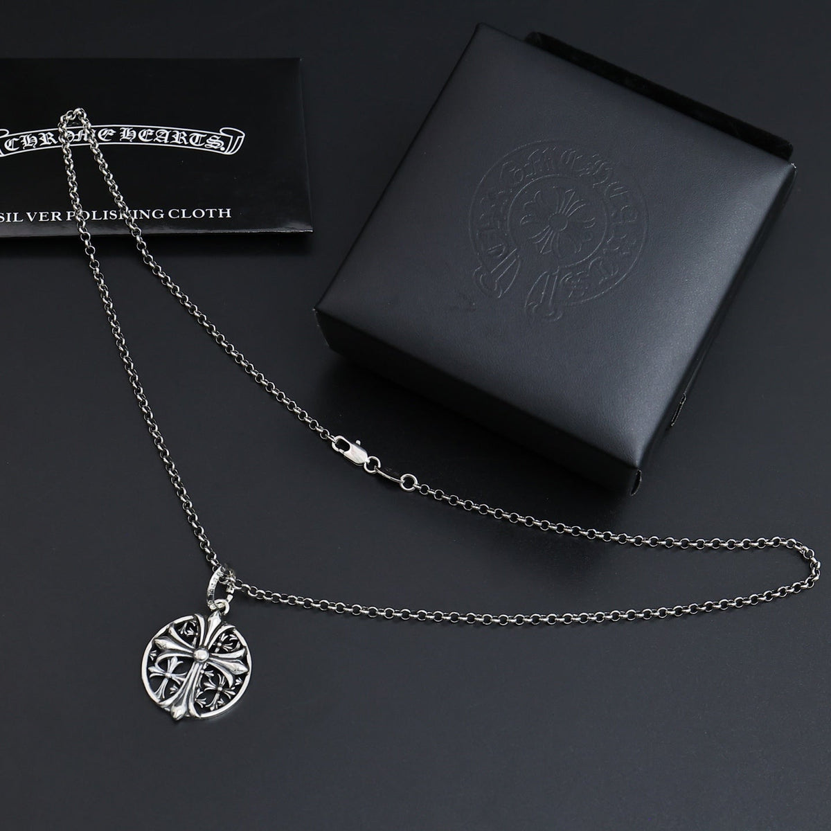 Martin Graham pendant necklace in polished metal-tone – side detail