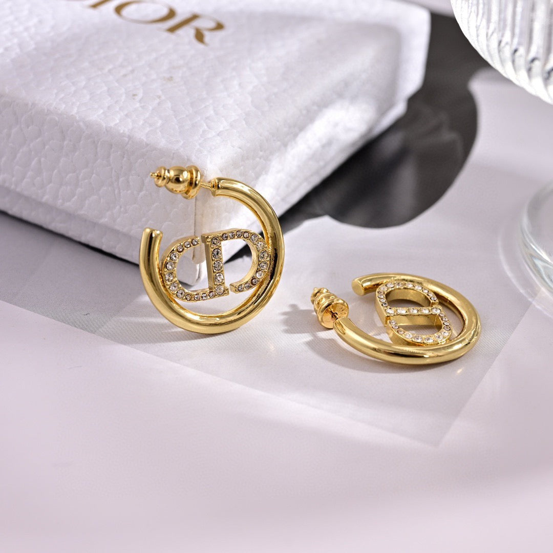 Martin Graham earrings in polished metal-tone – side detail