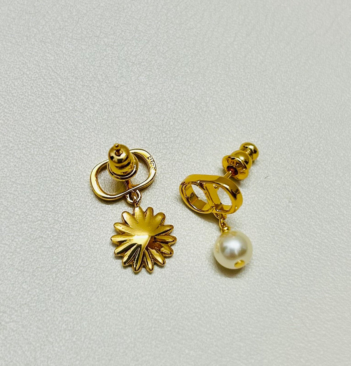 Martin Graham earrings in polished metal-tone – side detail