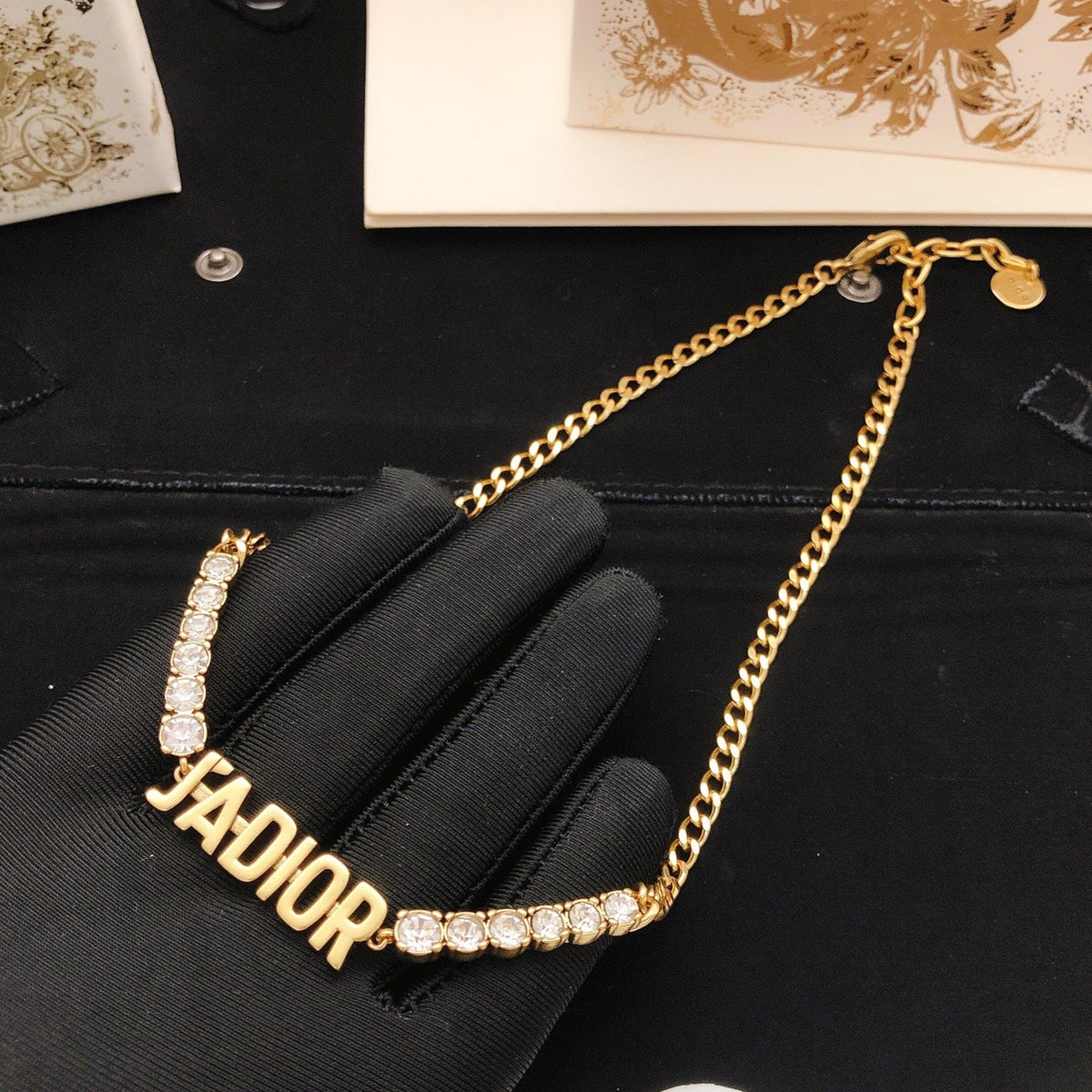 Martin Graham pendant necklace in polished metal-tone – side detail