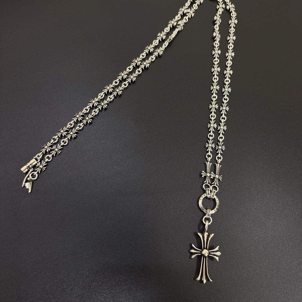 Martin Graham jewelry accessory in polished metal-tone – side detail