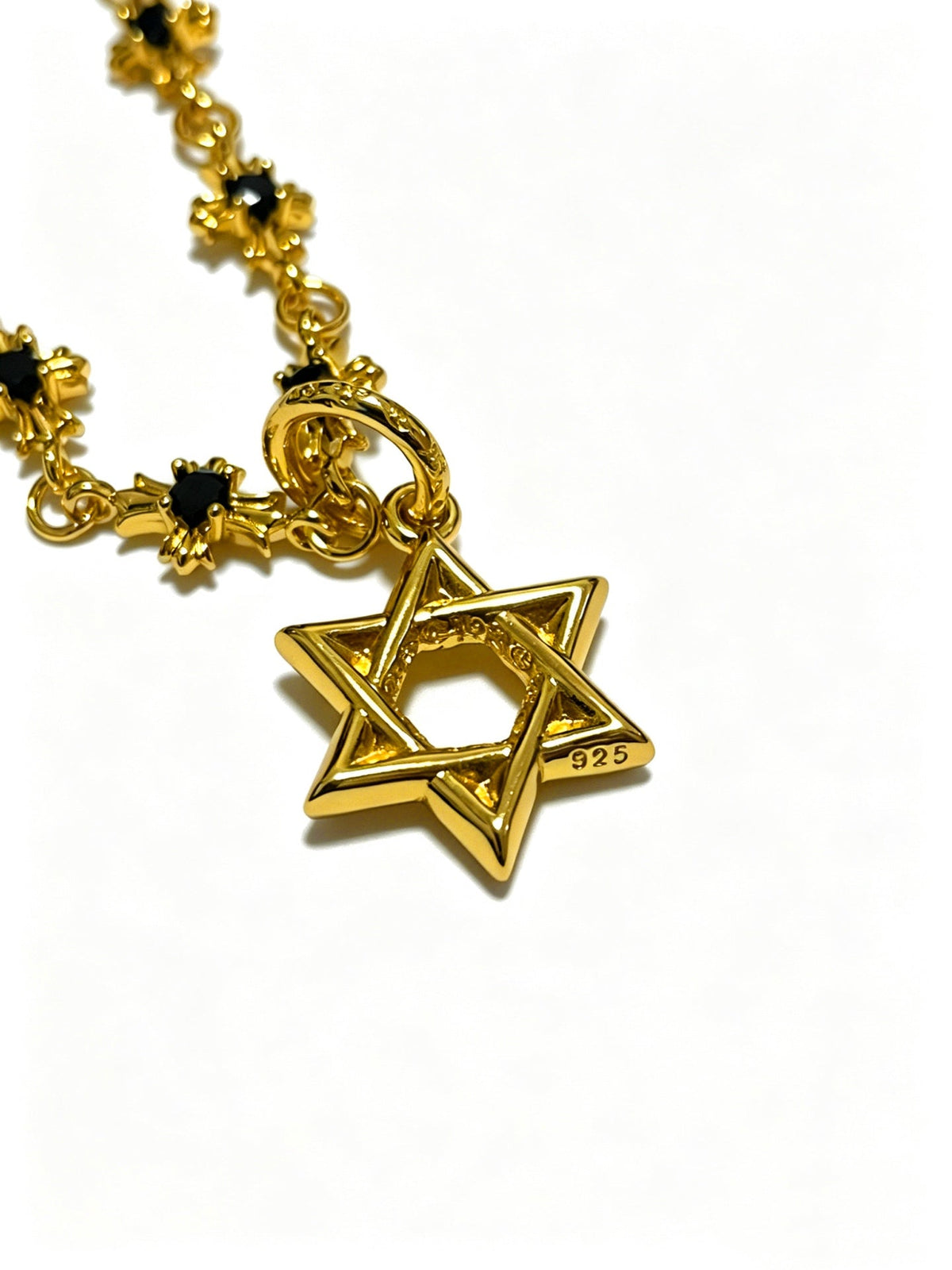 Martin Graham pendant necklace in polished metal-tone – side detail