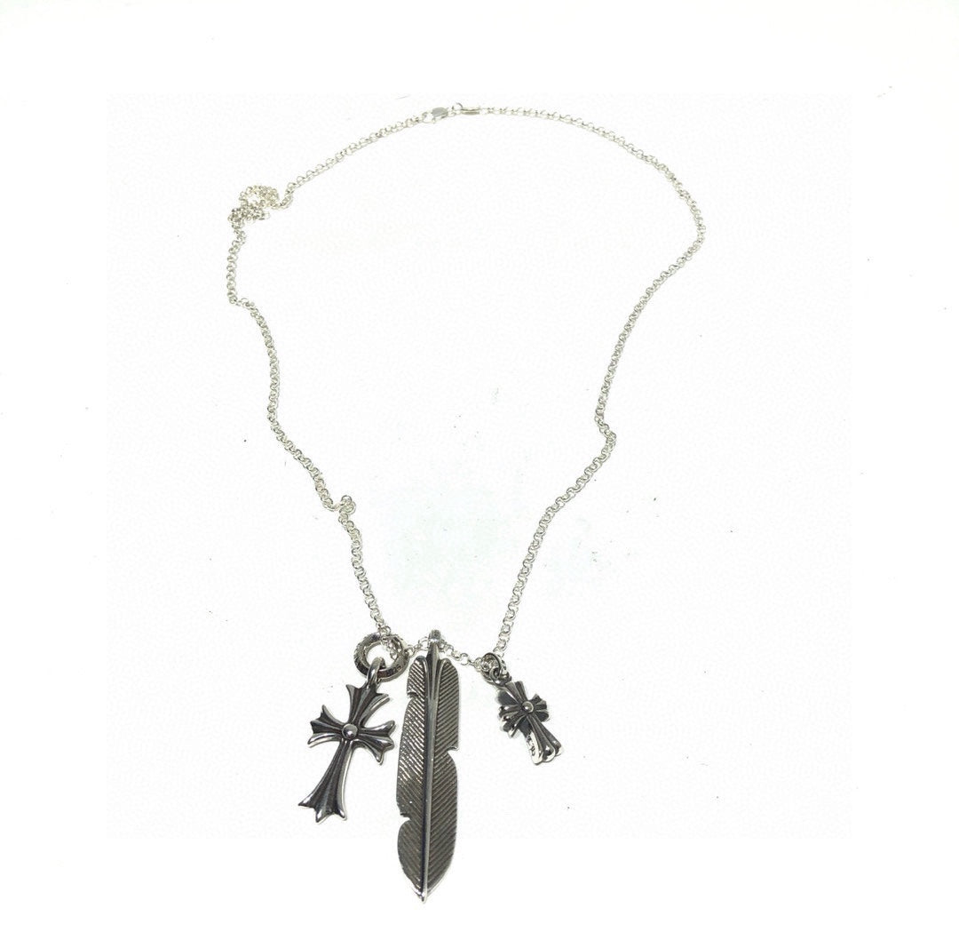 Martin Graham pendant necklace in polished metal-tone – side detail