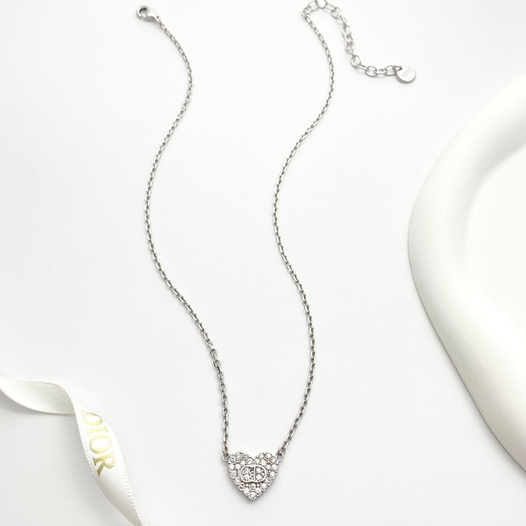 Martin Graham pendant necklace in polished metal-tone – side detail