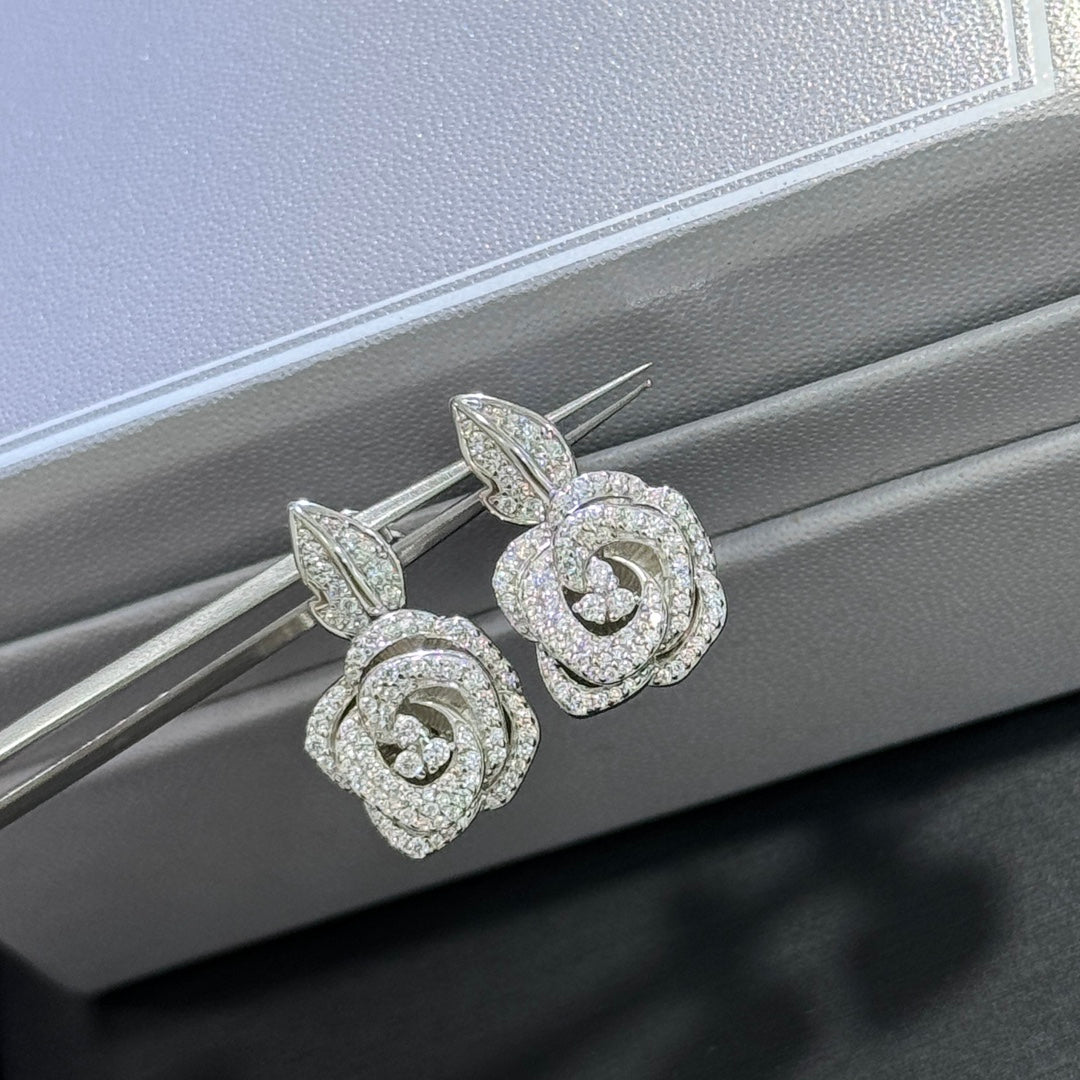 Martin Graham stud earrings in polished metal-tone – side detail