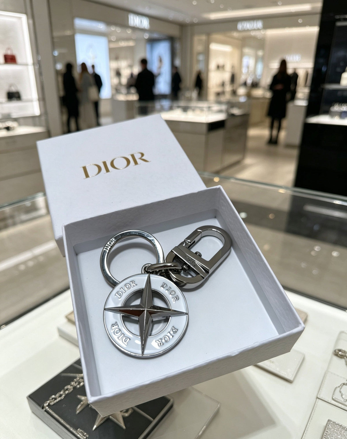 Martin Graham bag charm in polished metal-tone – side detail